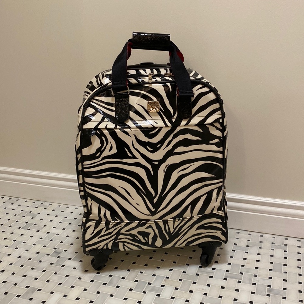 Carry-on suitcase by Brighton. Brand new condition!